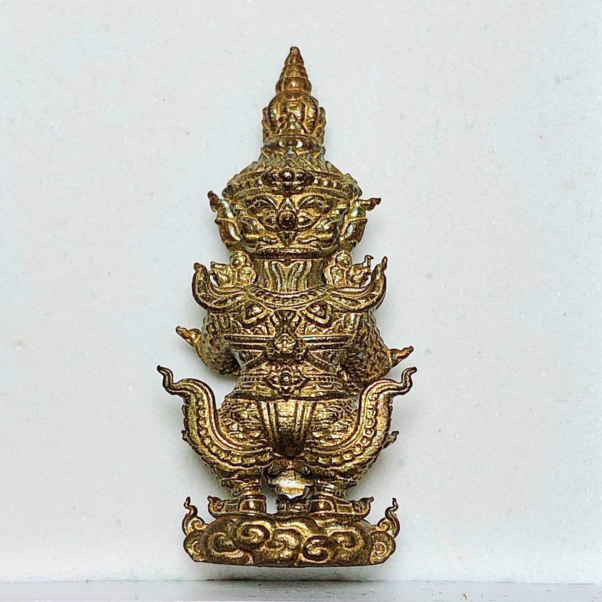 Thai wealth protection amulet decoratively designed as a sacred statue for prosperity and good fortune