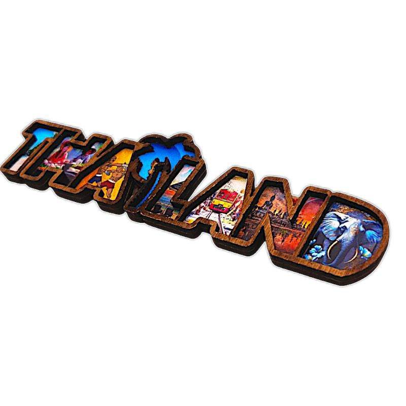 Thai wood magnet souvenir with colorful Thailand-themed designs and wooden cutout letters