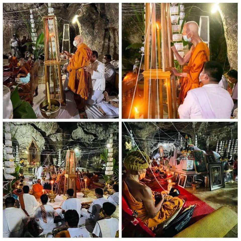 Monks performing consecration ceremony in cave shrine for Bia Gae Lord Vaisravana amulet
