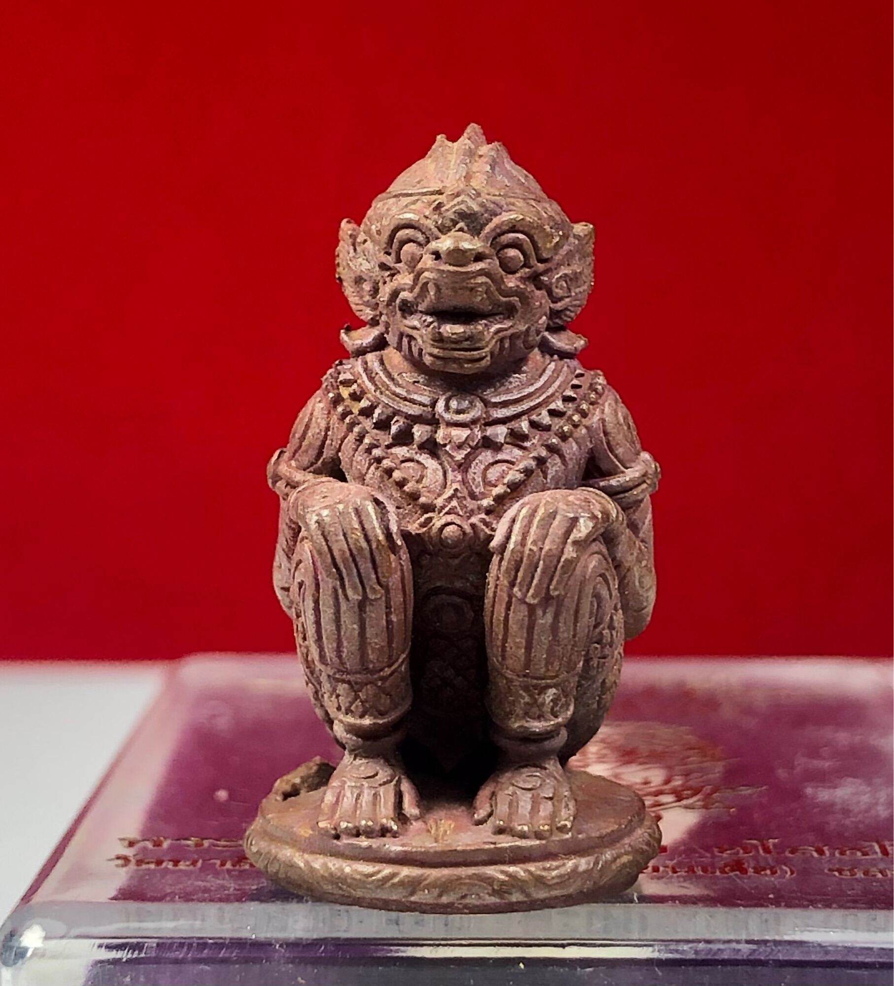 Hanuman Maha Prap Amulet small seated Hanuman figurine in antique brown detailed carving