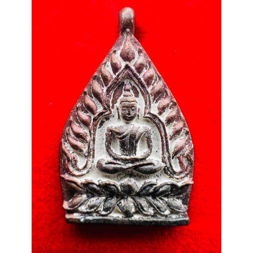 Antique silver amulet pendant with seated Buddha in flame arch on lotus base limited edition Thai lucky charm