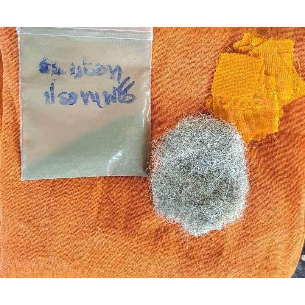 Mangkhang Ramruai amulet for prosperity set with beige powder pouch yellow cloth squares and gray hair bundle