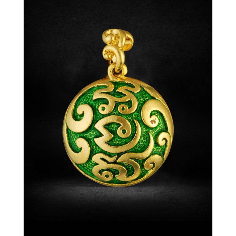 Gold and green enamel Naga prosperity coin Thailand pendant with swirling Naga motifs and bail