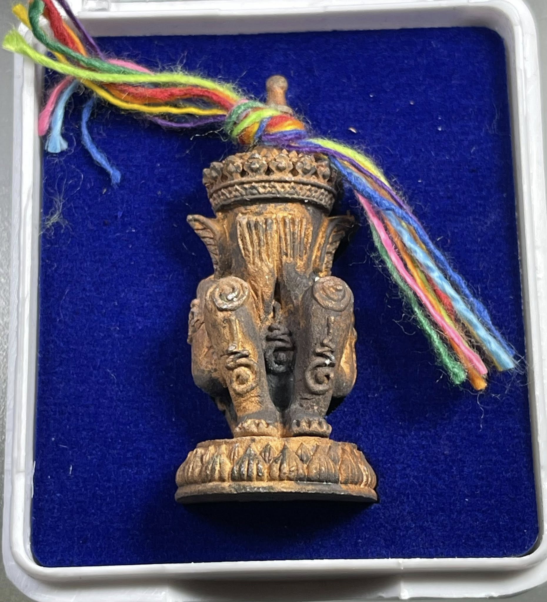 Thai carved wooden Norah Chatri Pi Takta amulet for protection. In blue velvet case with multicolor braided cord
