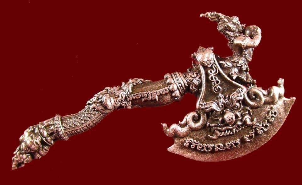 Phaya Khwan Maha Prap Amulet ornate silver ceremonial axe amulet with carved deity figure and detailed Thai motifs