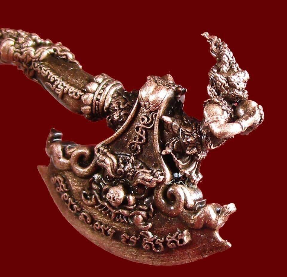 Phaya Khwan Maha Prap Amulet detailed bronze guardian figure with engraved Thai script and ornate blade