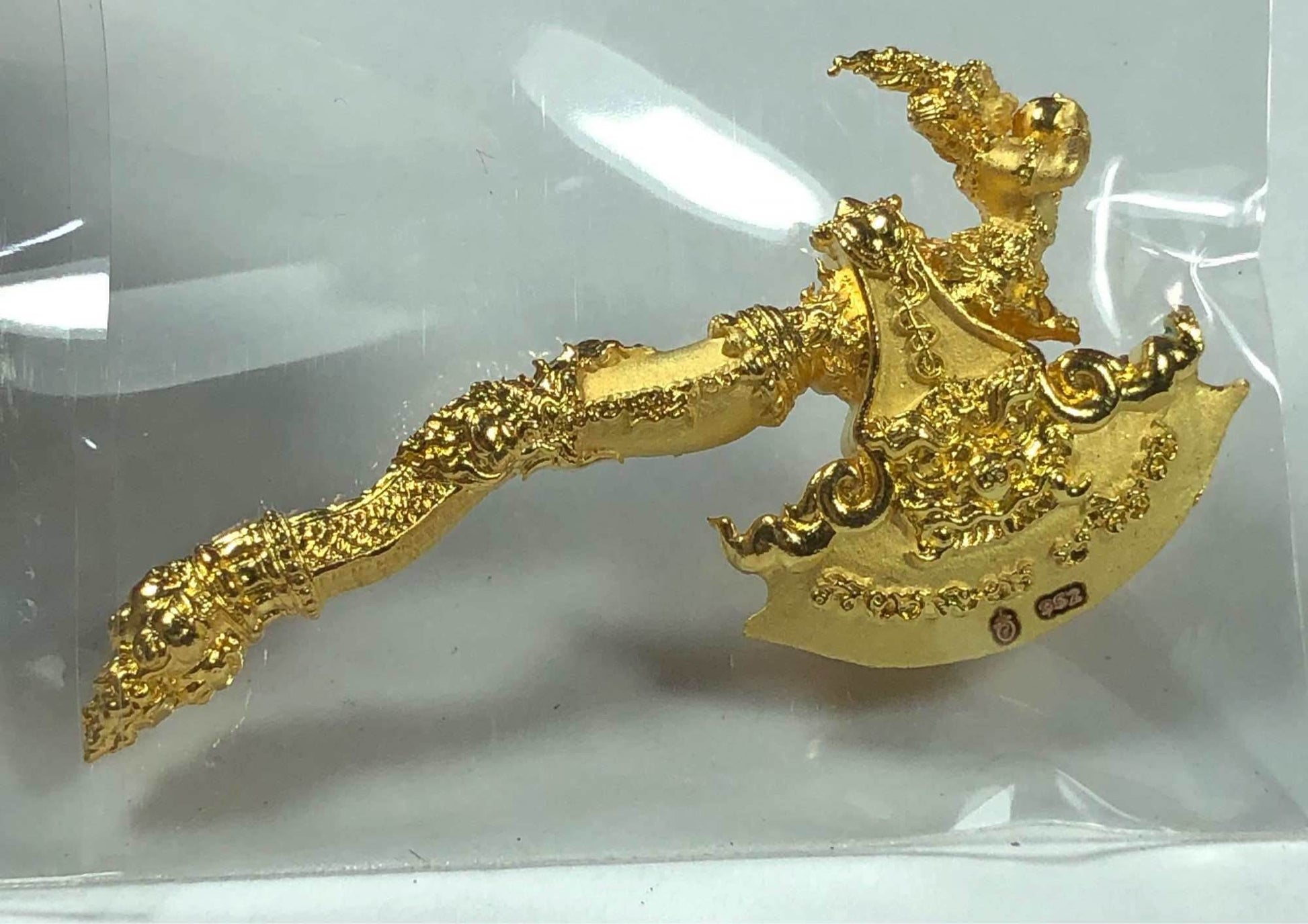 Gold ornate ceremonial axe amulet with Thai motifs Phaya Khwan Maha Prap Amulet Tak Sila Edition sacred talisman
