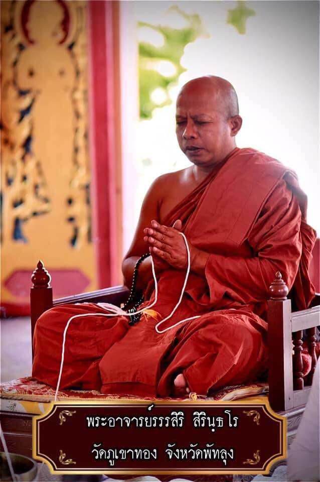 Phaya Khwan Maha Prap Amulet Tak Sila Edition with a meditating Buddhist monk in saffron robes holding prayer beads