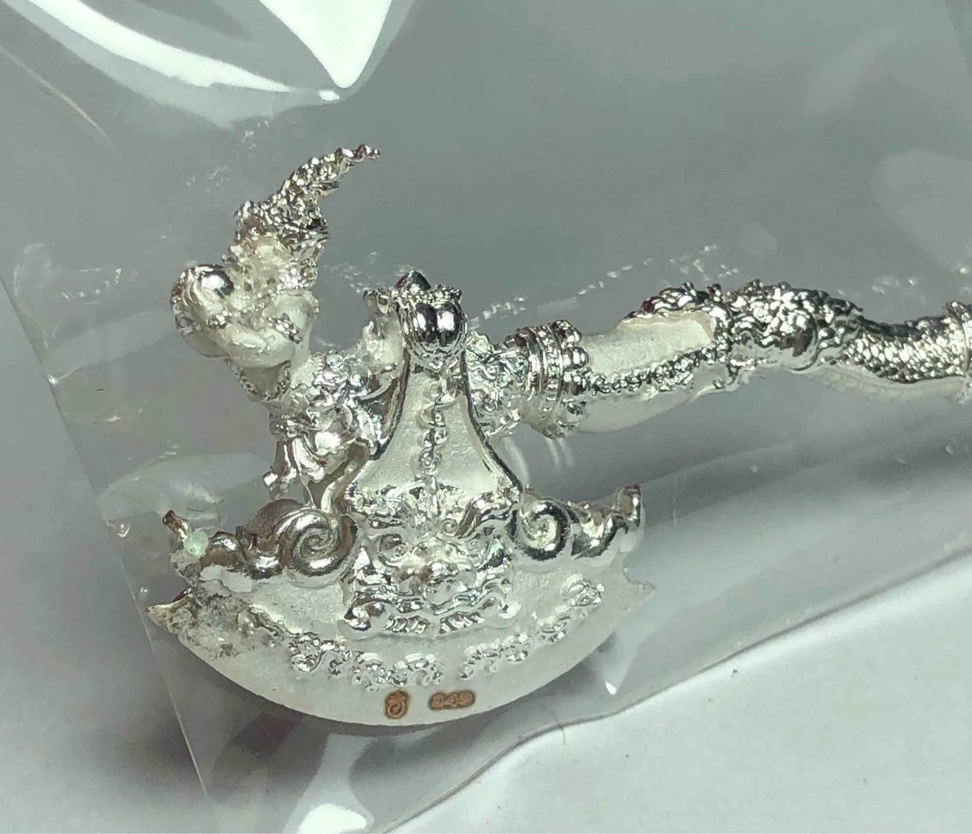 Phaya Khwan Maha Prap Amulet Tak Sila Edition silver ornate Thai religious talisman with naga handle in plastic wrap