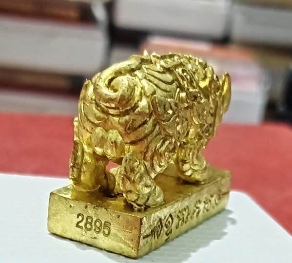 Gold amulet statue Phaya Moo Setthi - Luang Por Whan on engraved rectangular base talisman for home altar