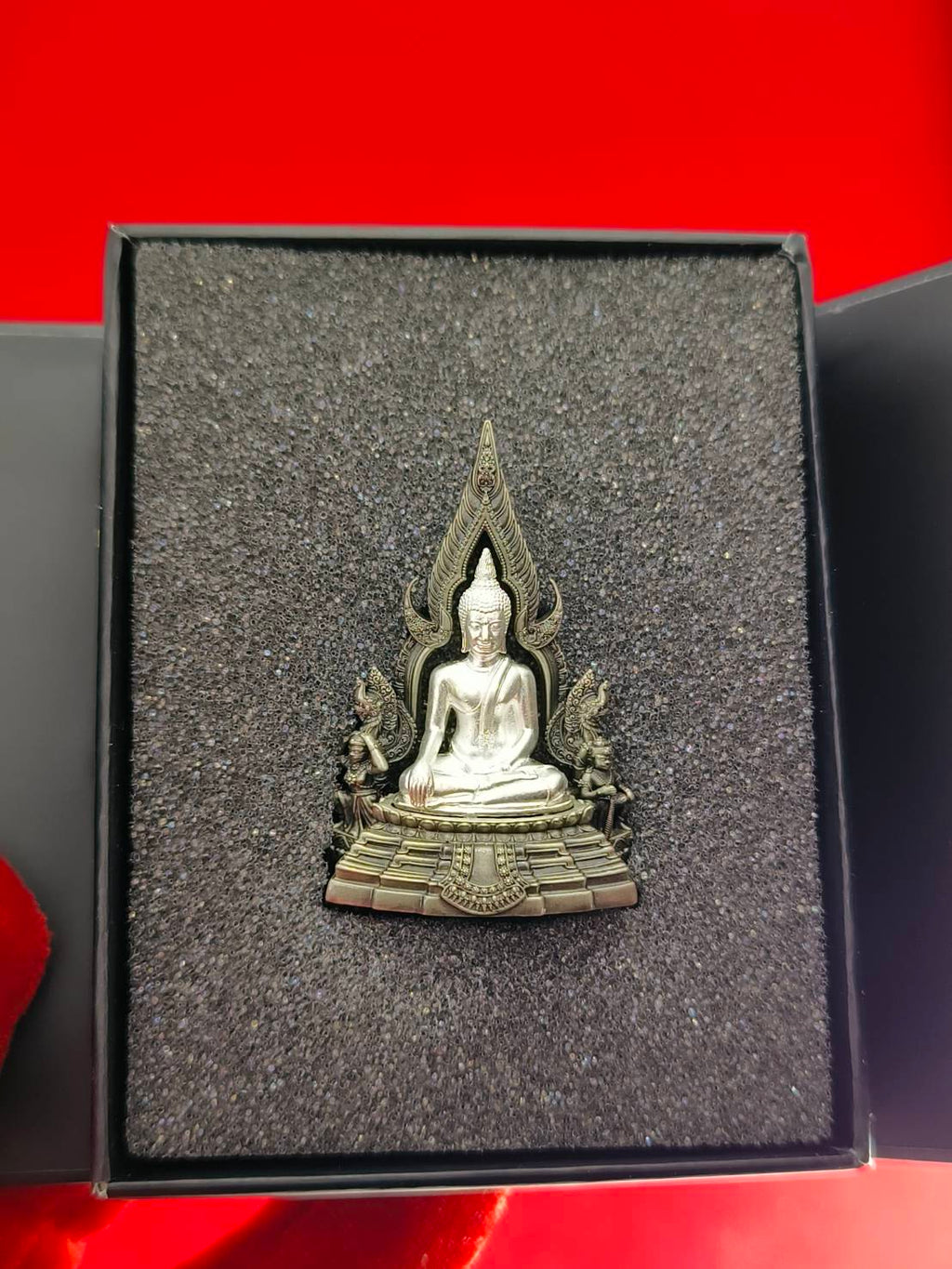 Thai Blessing Co Phra Phuttha Chinnarat amulet metal Buddha statue in ornate flame frame resting in foam gift box