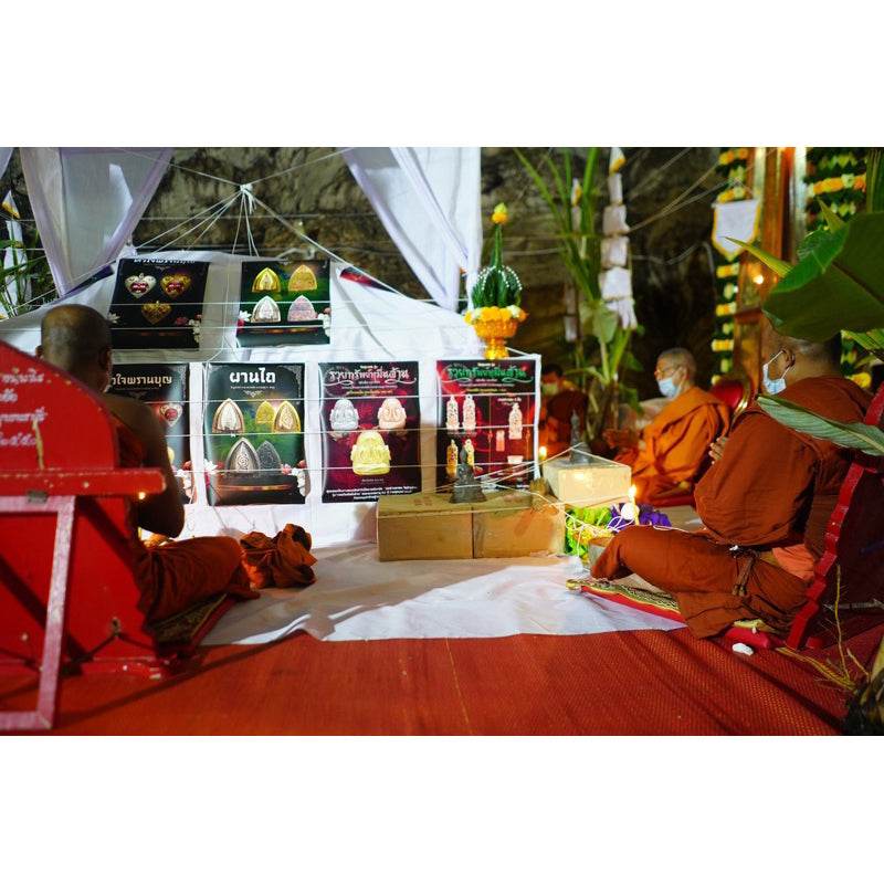 Thai Blessing Co monks blessing Phra Pidta amulet for sale display with offerings and ceremonial altar