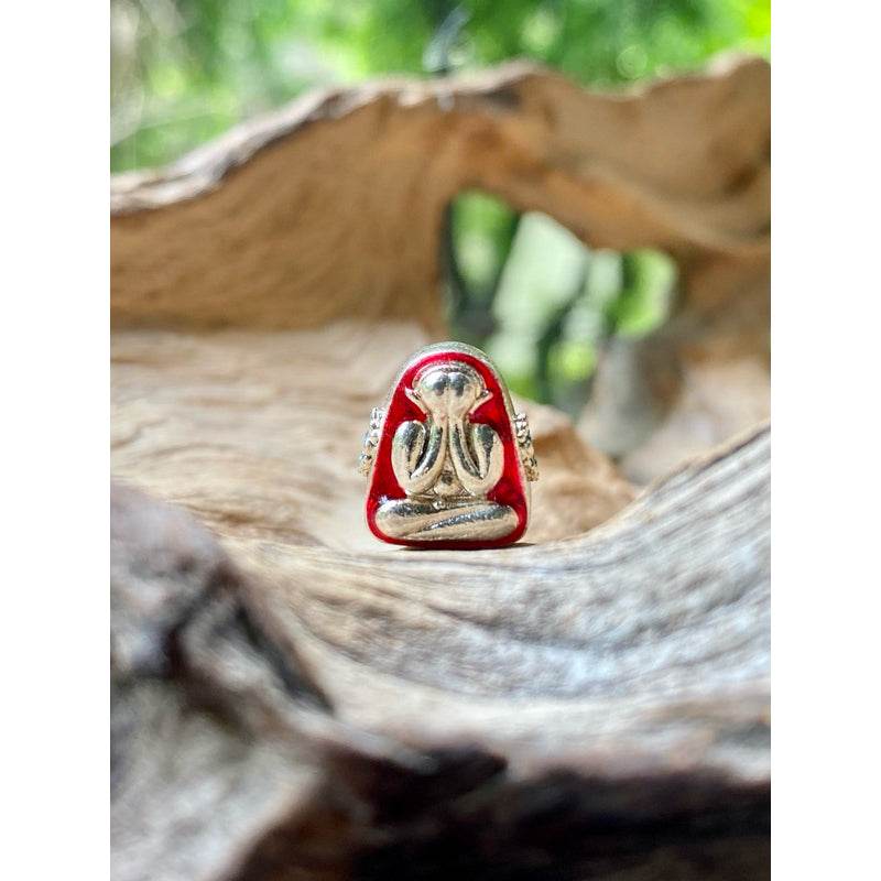Phra Pidta wealth amulet red enamel silver figure covering its eyes Buddha on natural driftwood