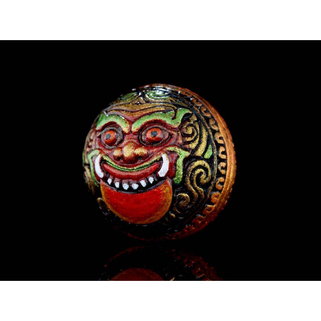Handpainted metal Rahu Amulet with colorful demon face and ornate gold filigree for home protection