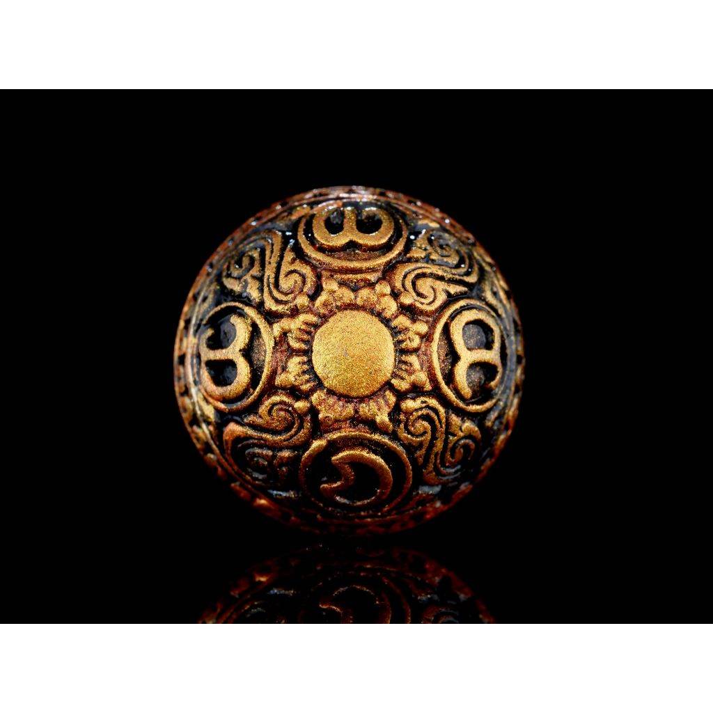 Rahu Amulet ornate round bronze pendant with gold sun center and embossed swirling sacred motifs