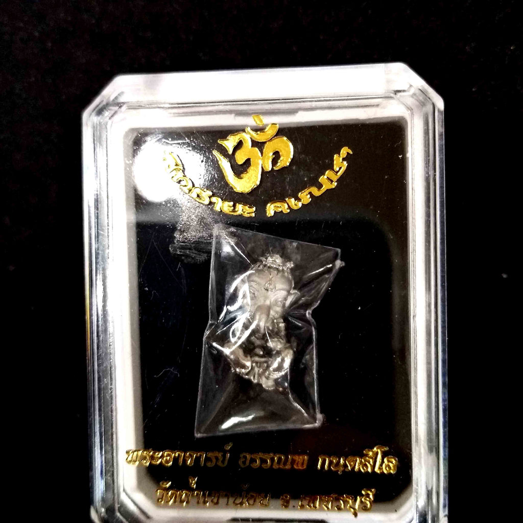 Sacred Thai Ganesh pendant in clear plastic display case with gold Thai script and Om symbol