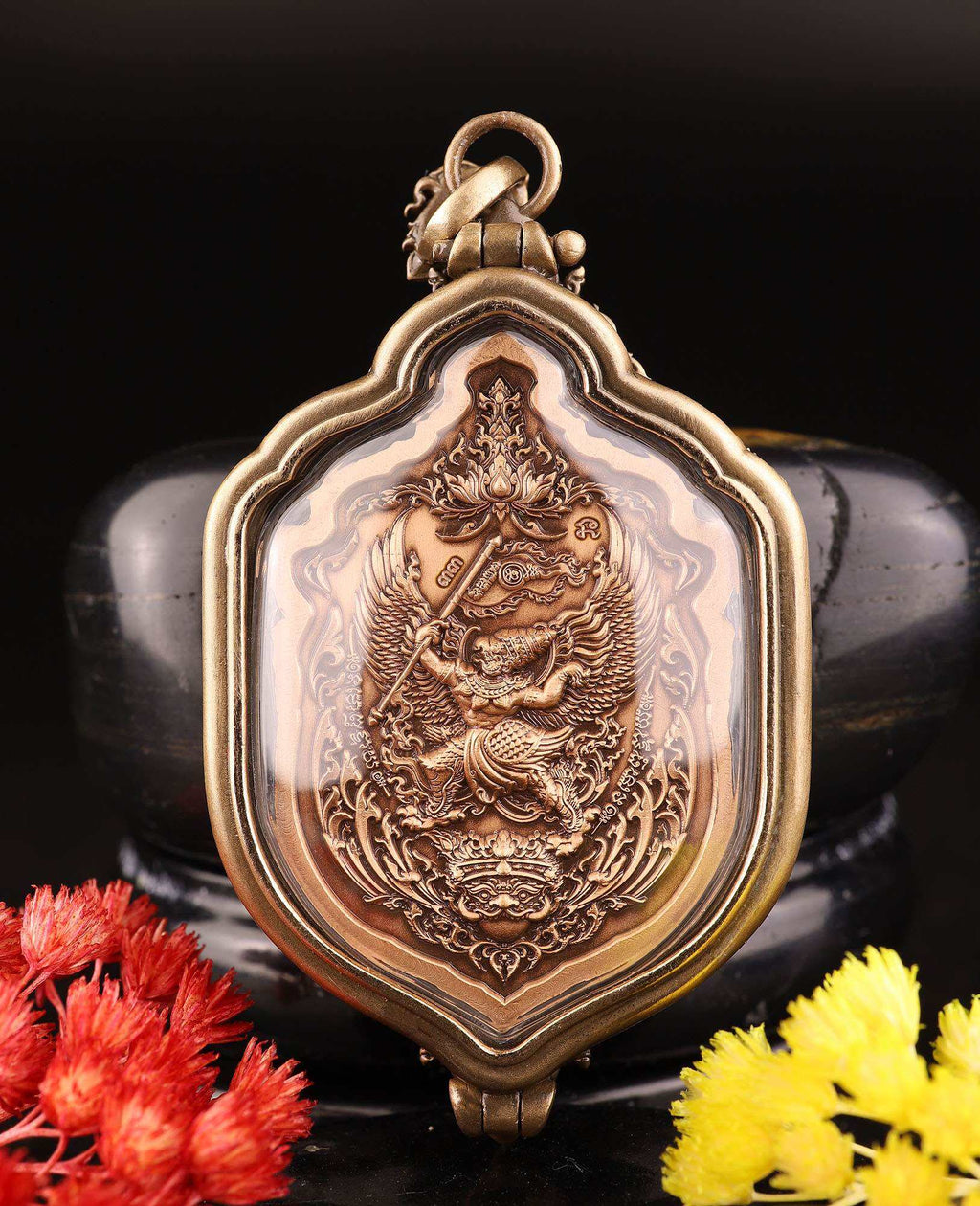 Thao Wessuwan amulet for protection bronze decorative pendant in ornate gold frame with red and yellow flowers