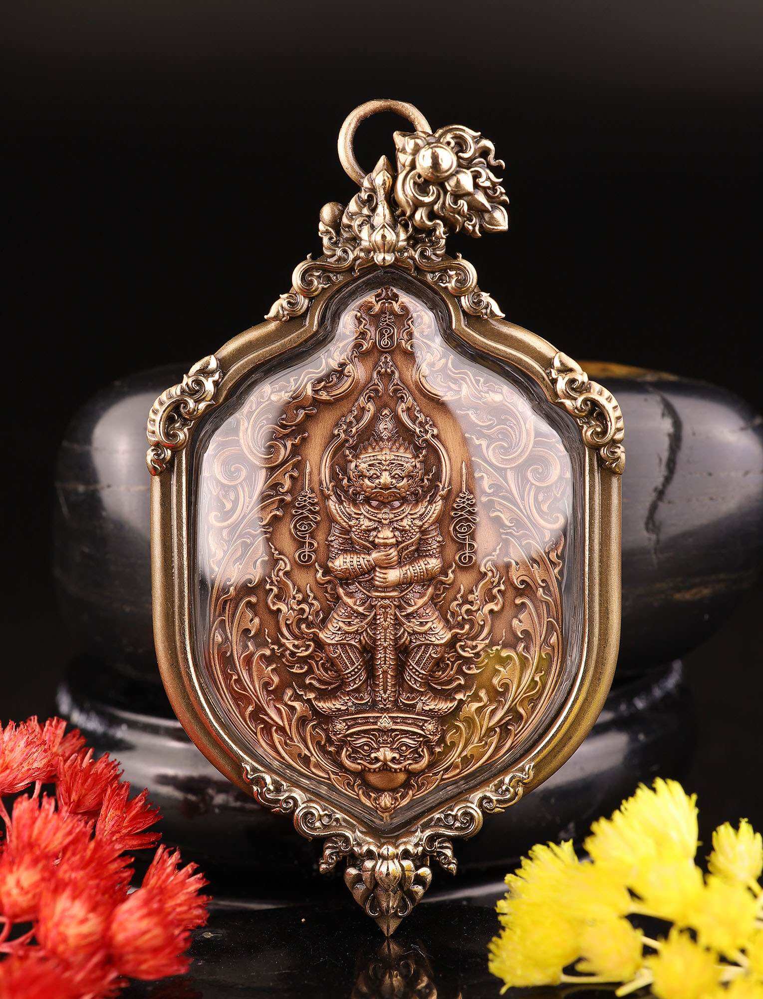 Thao Wessuwan amulet for protection ornate Thai bronze pendant with detailed guardian deity carving and decorative frame