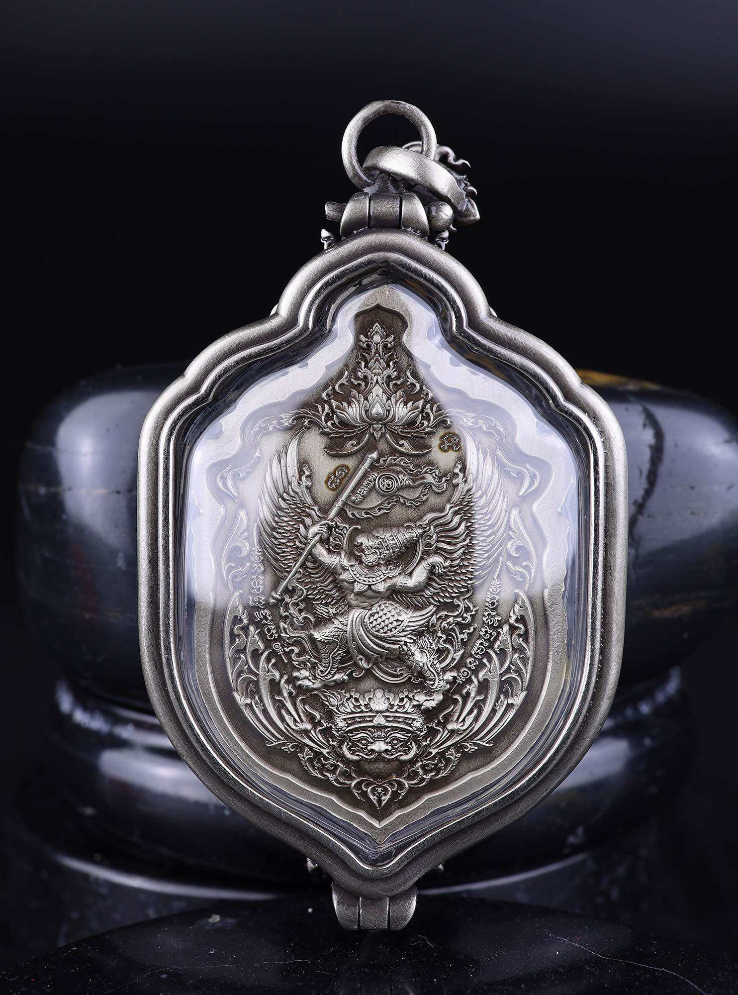 Thai Blessing Co silver pendant featuring detailed Thao Wessuwan amulet for protection embossed in metal