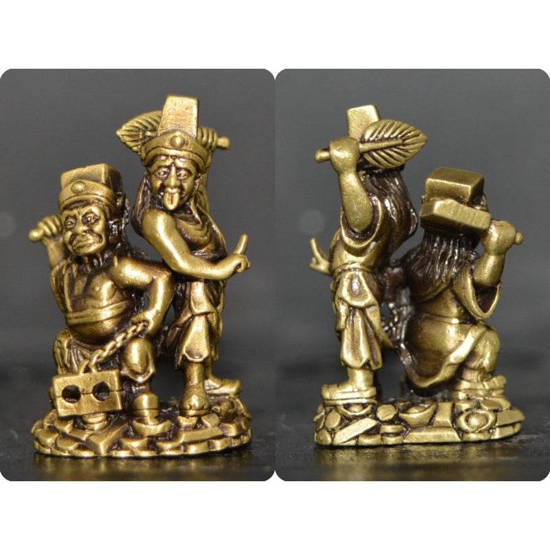 Tua Pae-Yee Pae Amulet - 2 Deities of Wealth small brass statue of two standing deities on a coin patterned base
