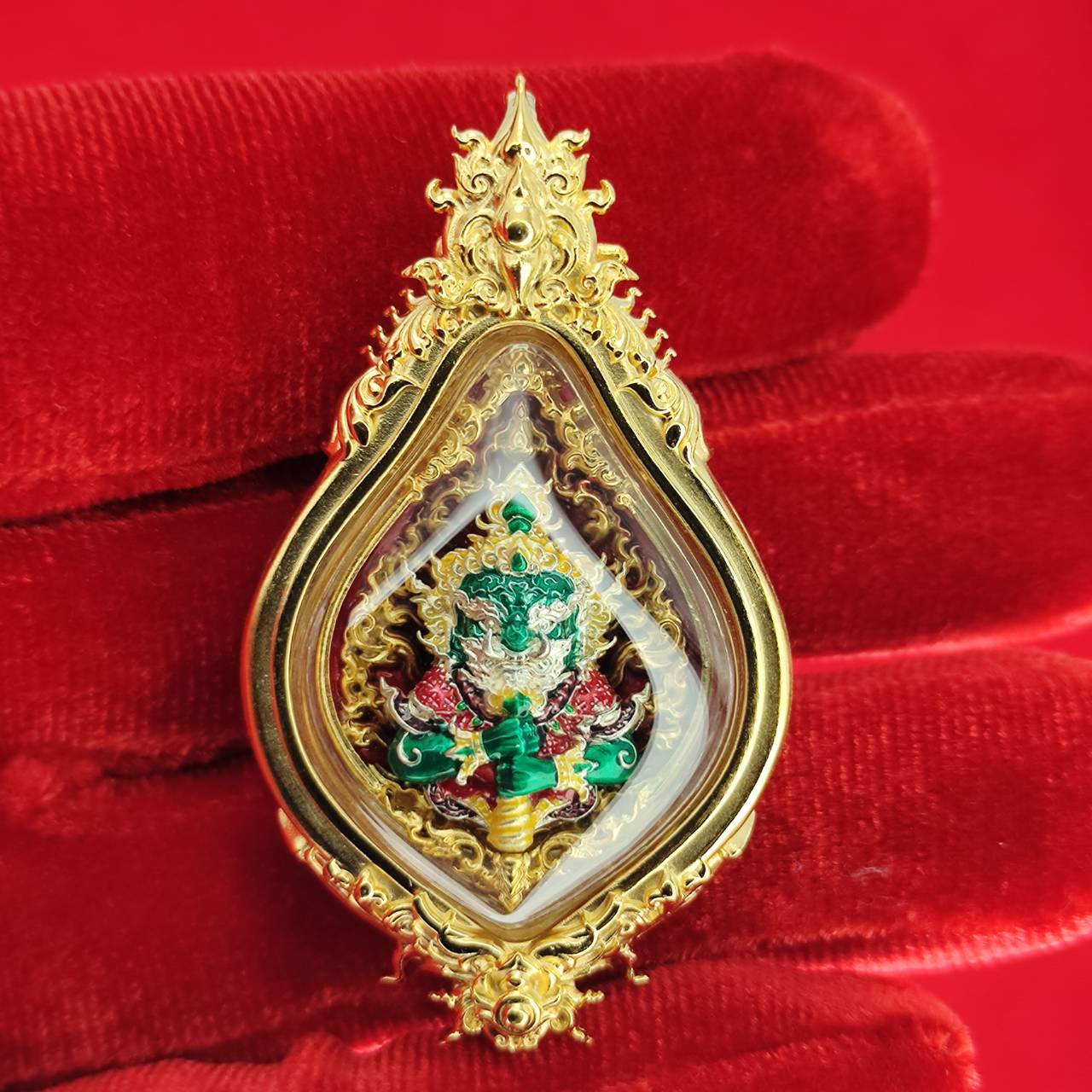 Thao Wessuwan amulet for protection encased in ornate gold with intricate details