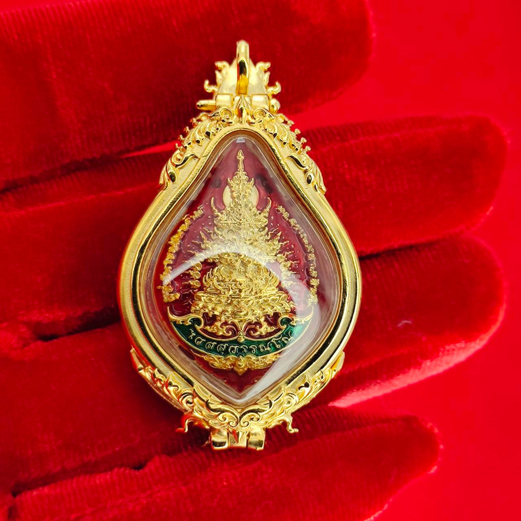 Thao Wessuwan amulet for protection in ornate gold frame with detailed design