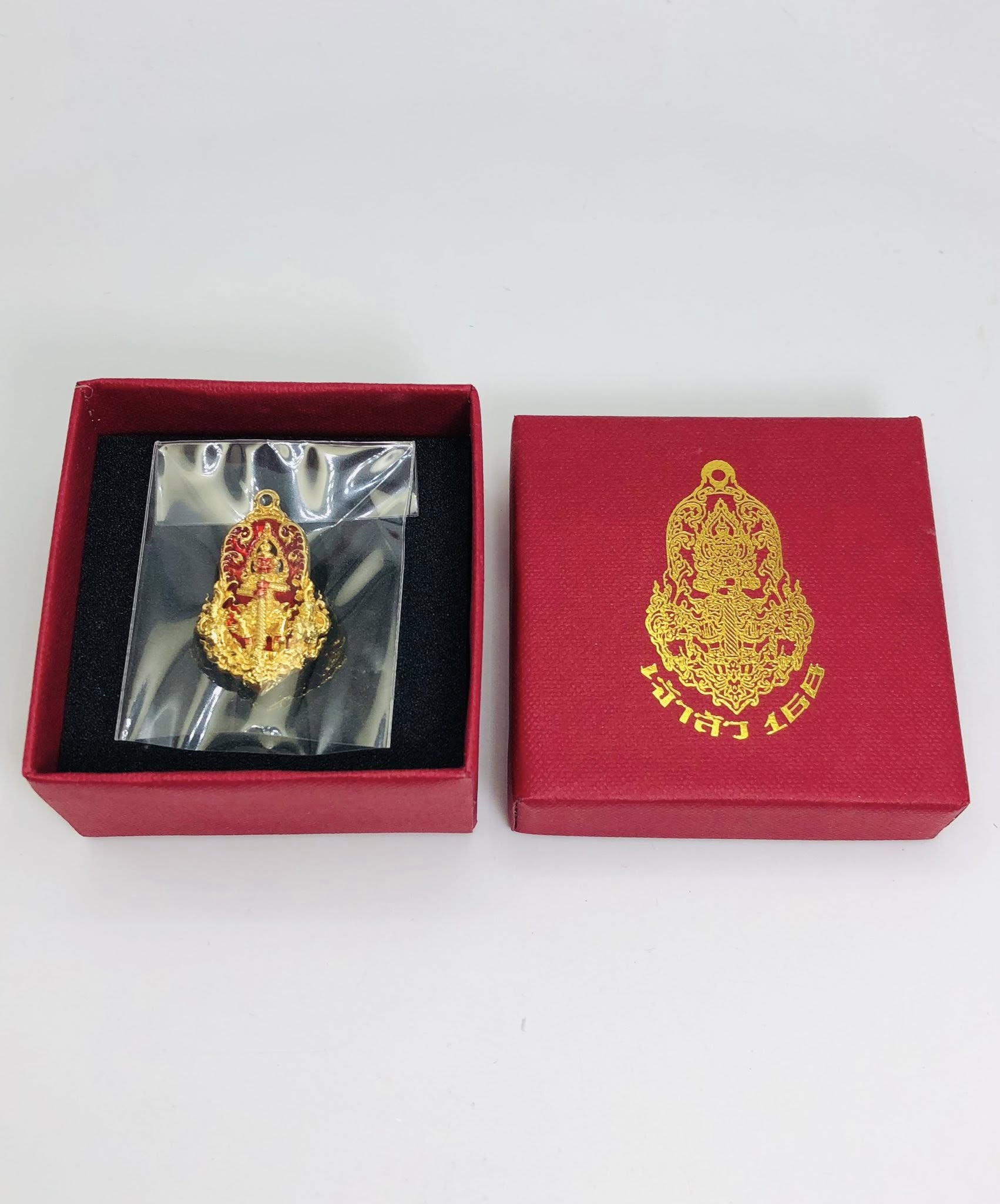 Thao Wessuwan amulet for sale in a decorative red box by Thai Blessing Co with protective cover