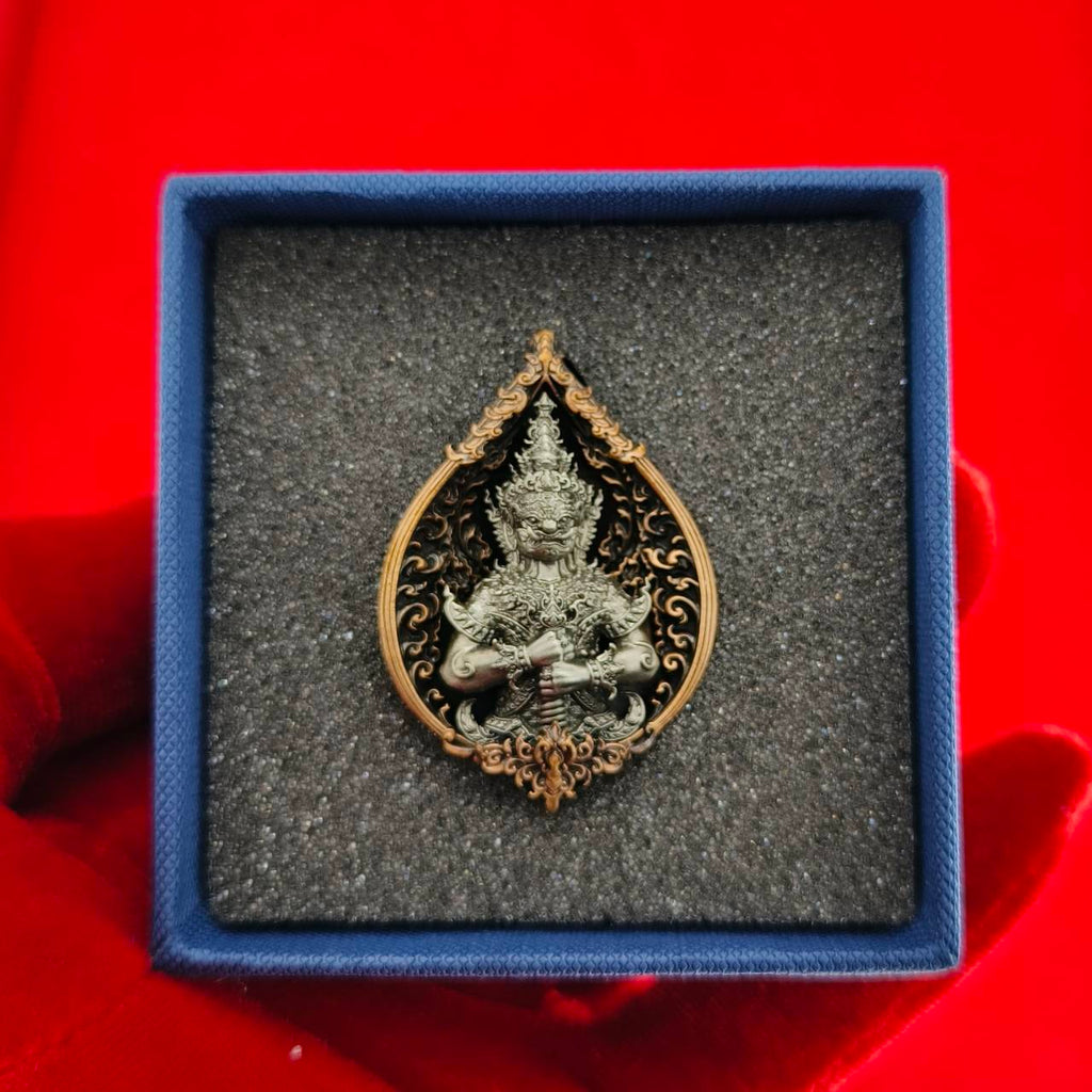 Thao Wessuwan amulet for wealth in an elegant display box with intricate detailing