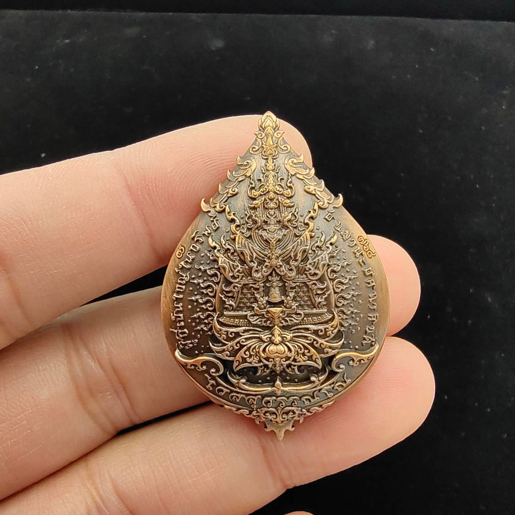 Thao Wessuwan amulet for wealth made with intricate details and a unique design, held in hand