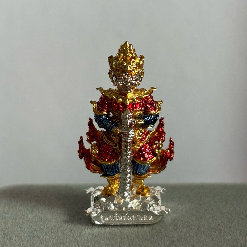 Colorful Thao Wessuwan amulet Thailand with intricate gold red and blue details from Thai Blessing Co