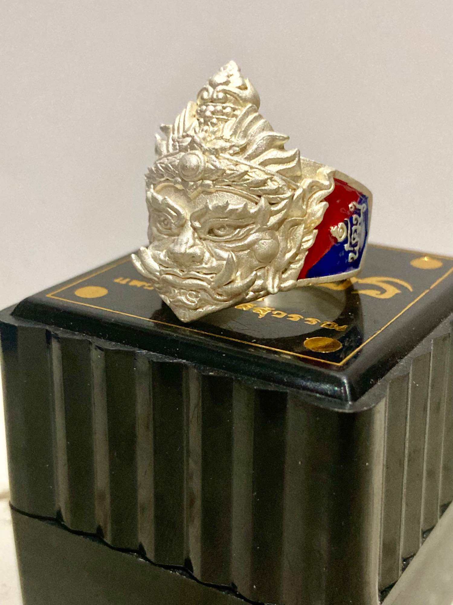 Thao Wessuwan protection ring in silver with intricate design, showcasing a guardian face for spiritual protection