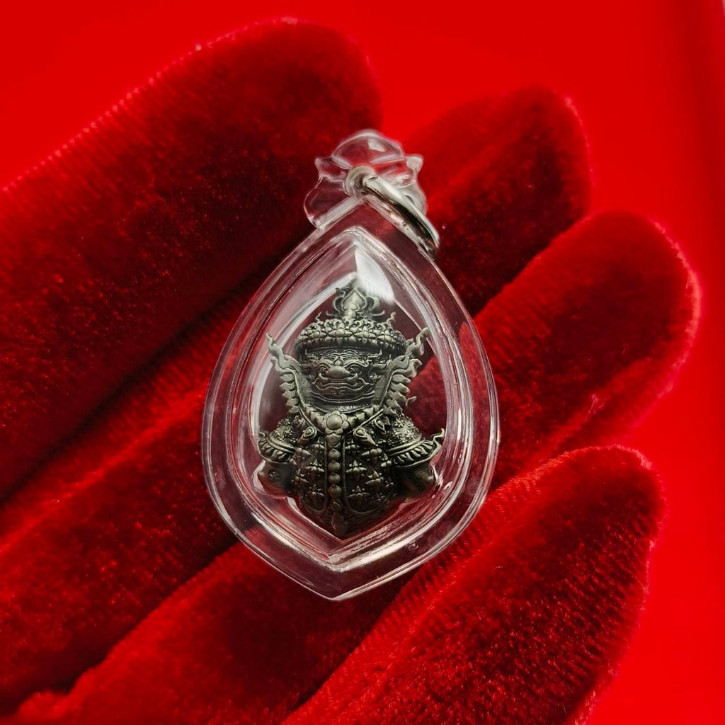 Thao Wessuwanno amulet encased in clear protective casing with intricate details and design
