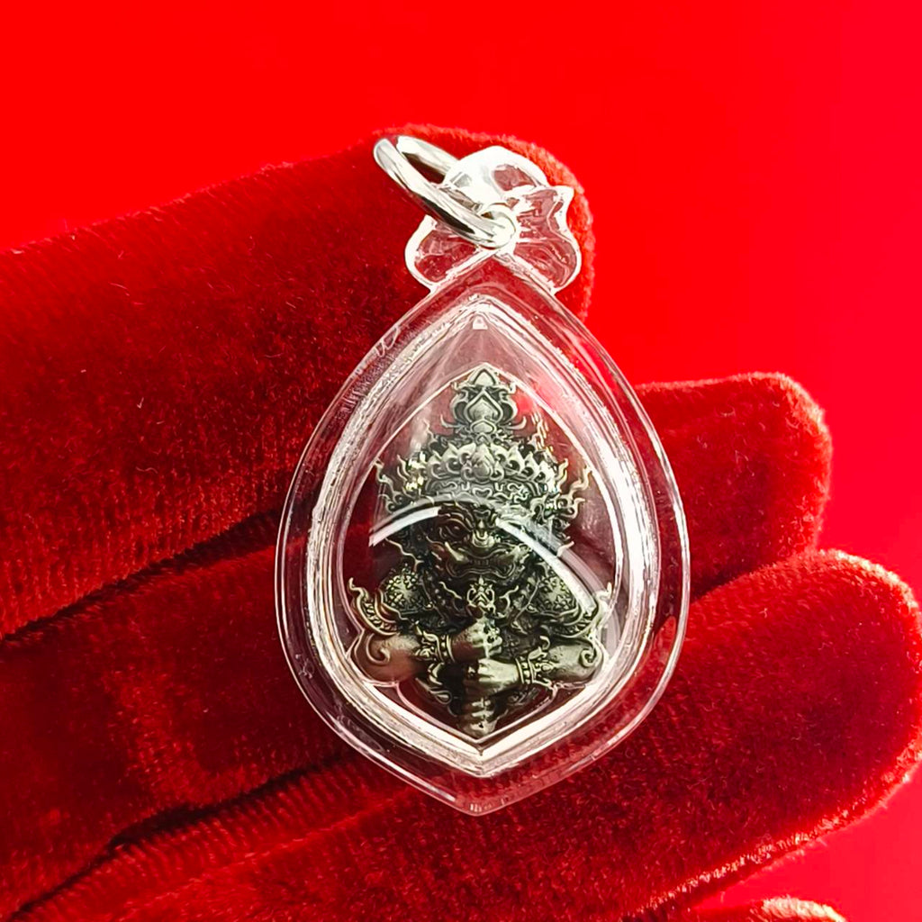 Thao Wessuwanno amulet in a protective casing for spiritual and decorative home use