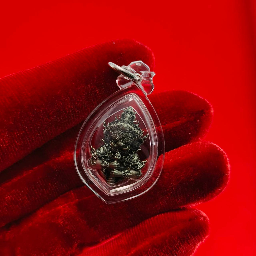 Thao Wessuwanno amulet enclosed in clear casing, designed for spiritual protection and decoration