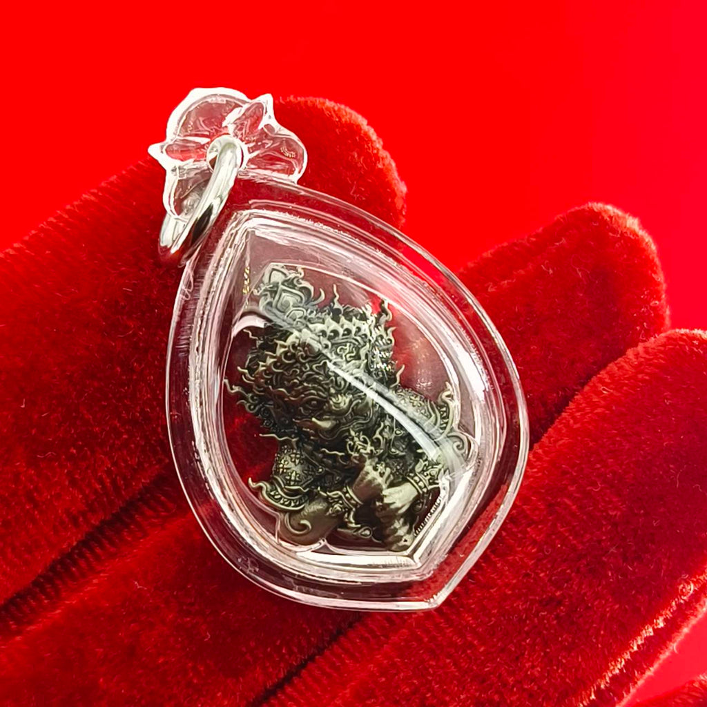 Thao Wessuwanno amulet encased in clear protective casing, featuring intricate details and craftsmanship
