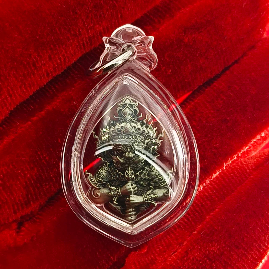 Thao Wessuwanno amulet encased in clear resin with intricate details for spiritual protection