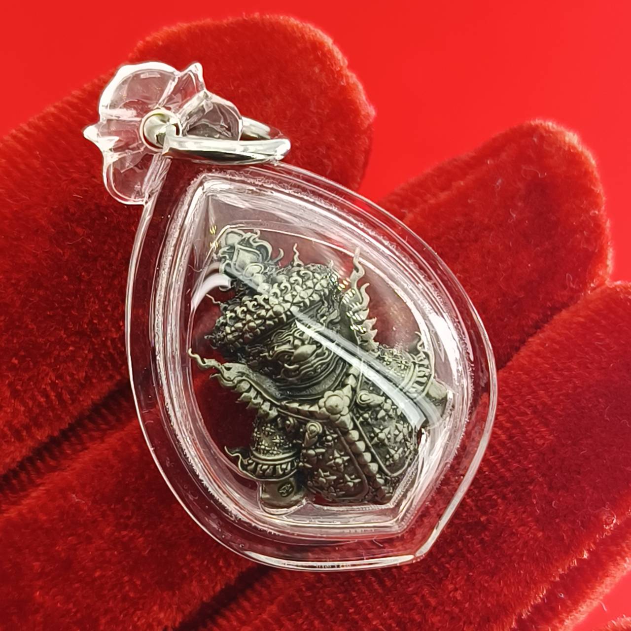 Thao Wessuwanno amulet encased in a protective pendant for spiritual blessings and protection