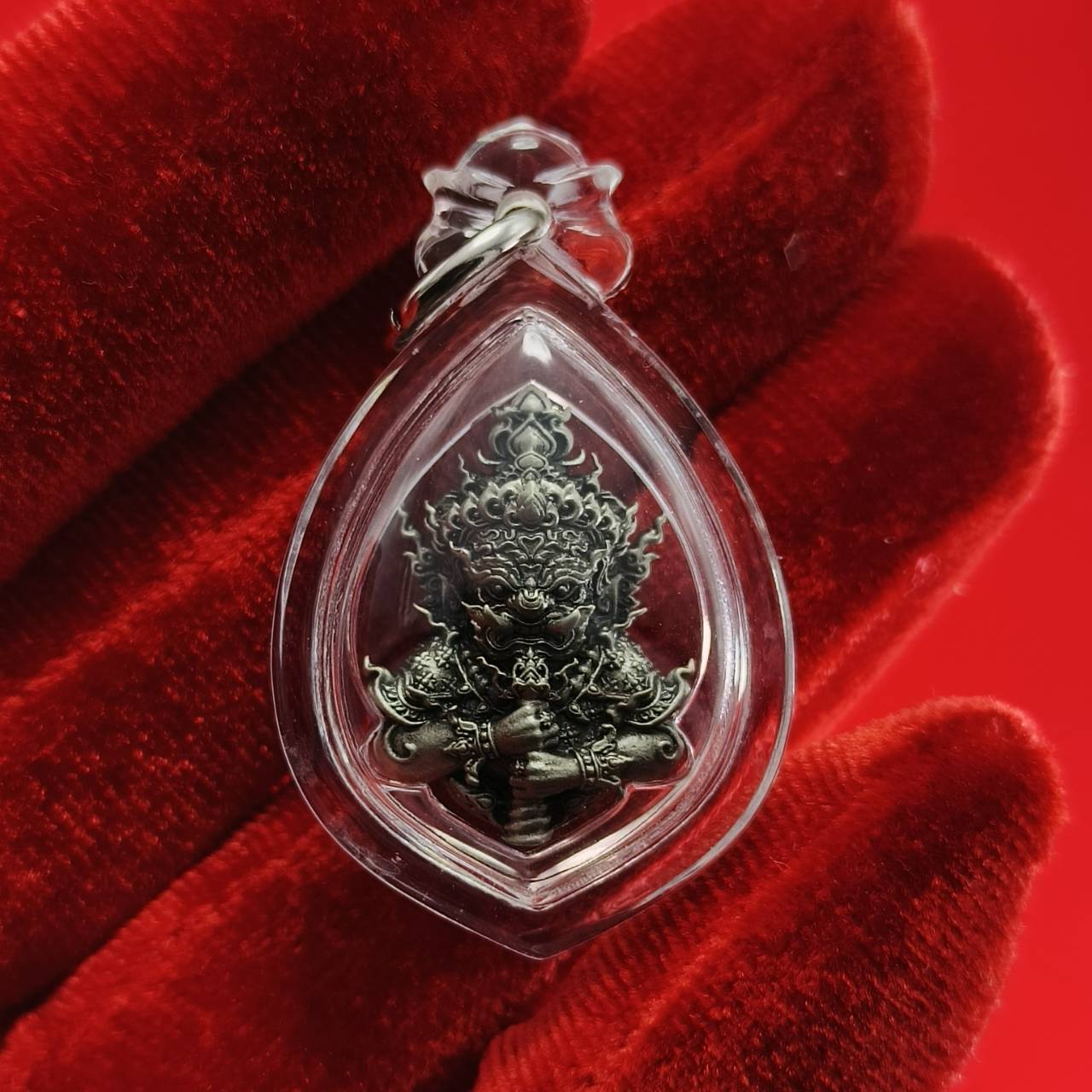 Thao Wessuwanno amulet in transparent pendant with intricate design for spiritual protection
