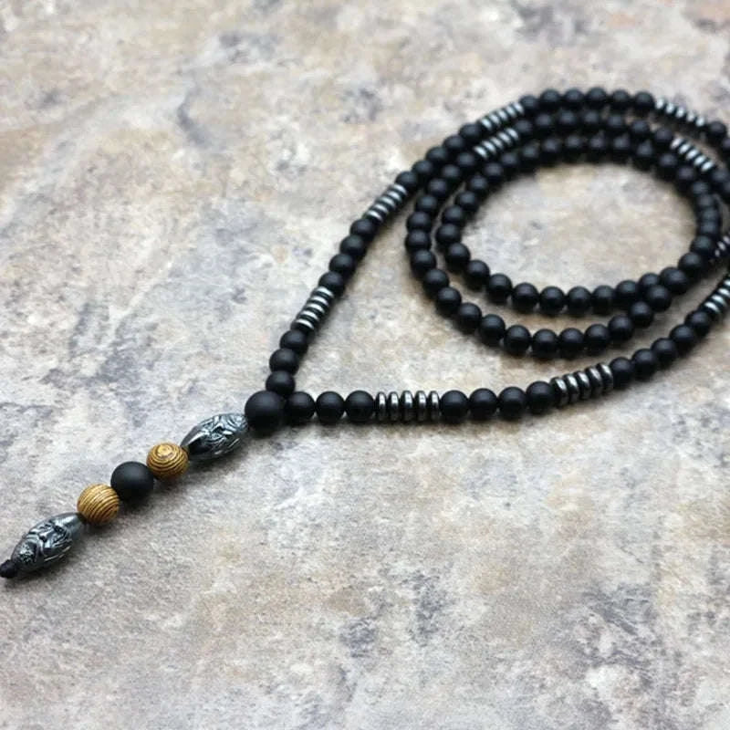 🗿 The "Ancestral Sage" Necklace: 6mm Hematite & Carved Tribal Elder Head Pendant (Wisdom & Protection)