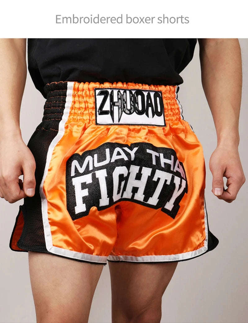 🥊The Apex Warrior Muay Thai Shorts: Professional Combat Performance Trunks – High-Definition Embroidery, Breathable Satin-Polyester, Custom Name/Logo Support, and Traditional Wide-Waistband Fit for Men, Women, and Kids
