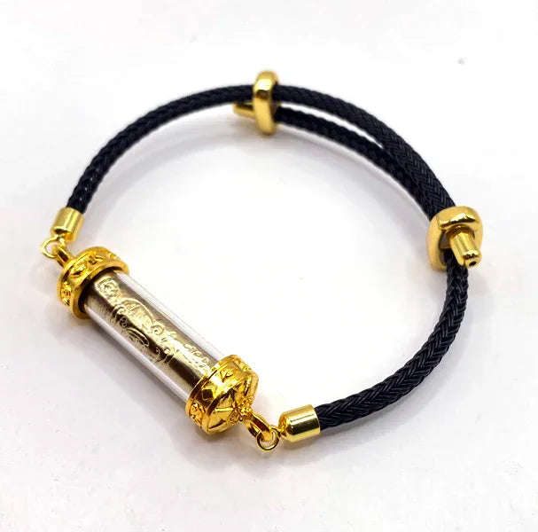 🔓 The Poverty Cure: Takrut "Gae Jon Plod Nee" (Debt Clearing & Wealth) - Ajarn Plian, Khao Or Lineage (Year 2025) Gold-plated amulet to ward off poverty (with black cord bracelet).