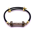 🔓 The Poverty Cure: Takrut "Gae Jon Plod Nee" (Debt Clearing & Wealth) - Ajarn Plian, Khao Or Lineage (Year 2025) Gold-plated and black amulet to ward off poverty (with black cord bracelet).