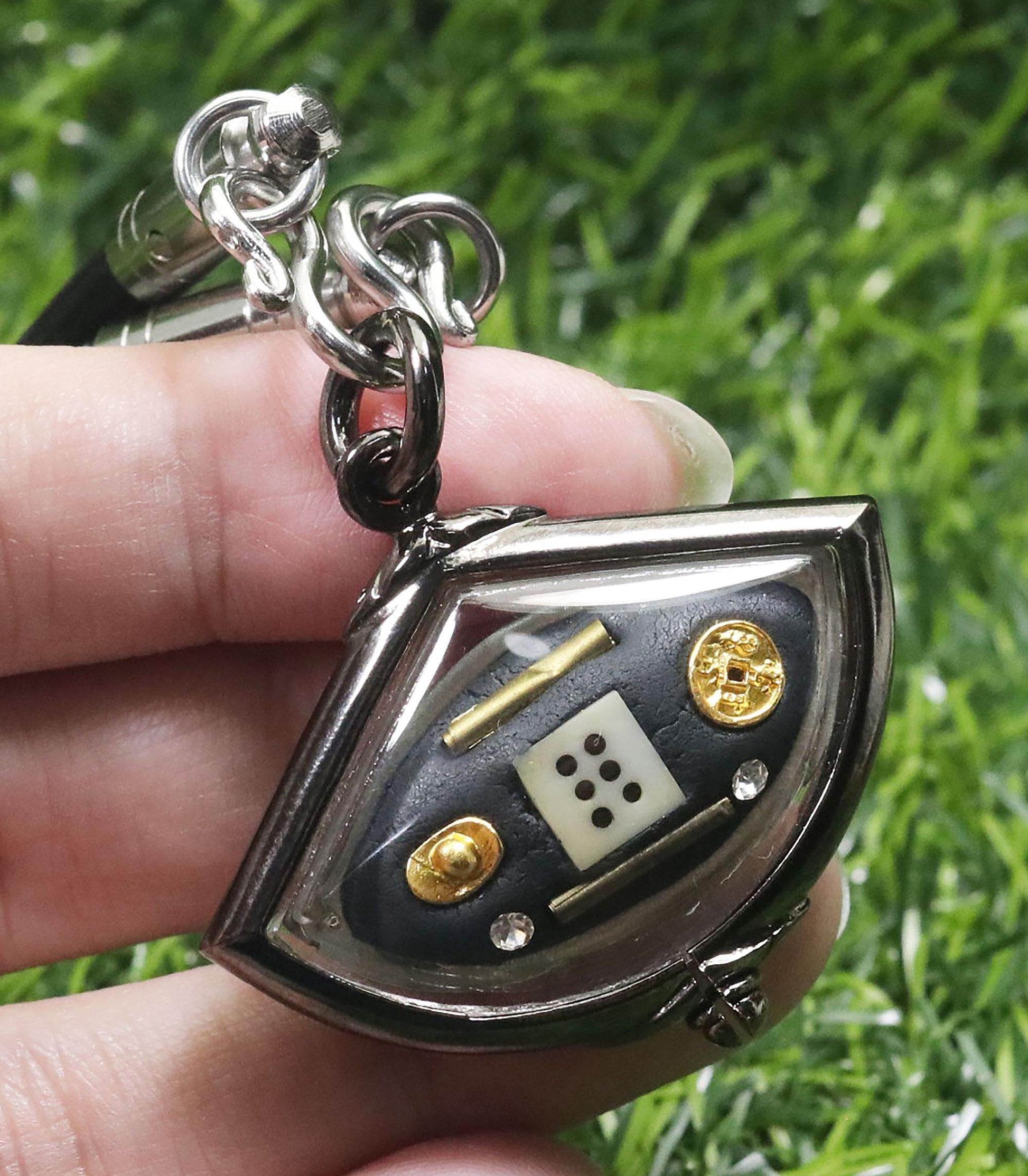 Third eye amulet for protection showcasing intricate design with gold accents and symbols