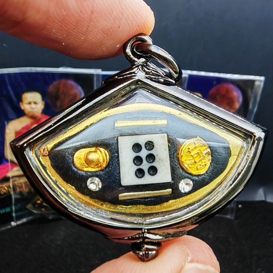 Third eye amulet for protection featuring an eye design with intricate details and gold accents