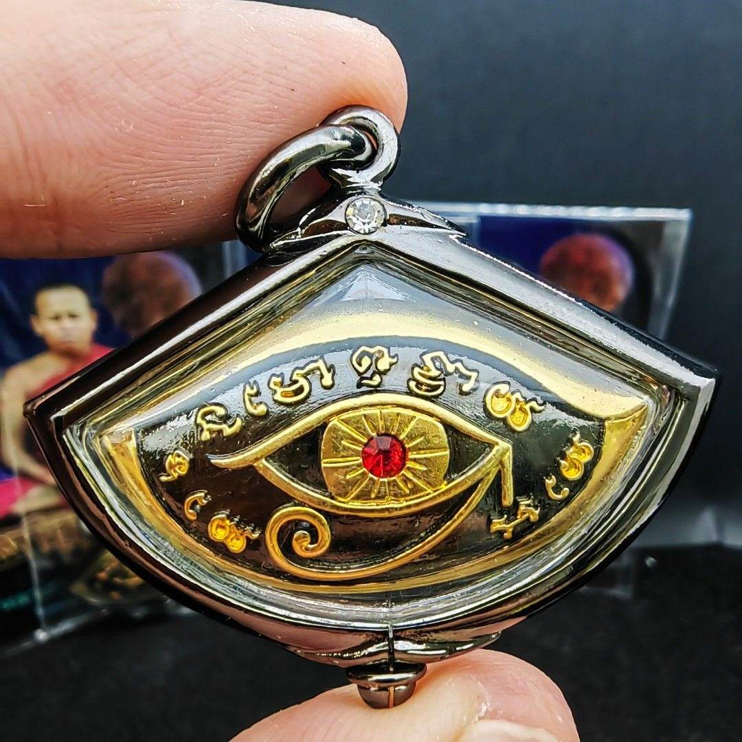 Third eye amulet for protection featuring intricate designs and a red gem, ideal for spiritual defense