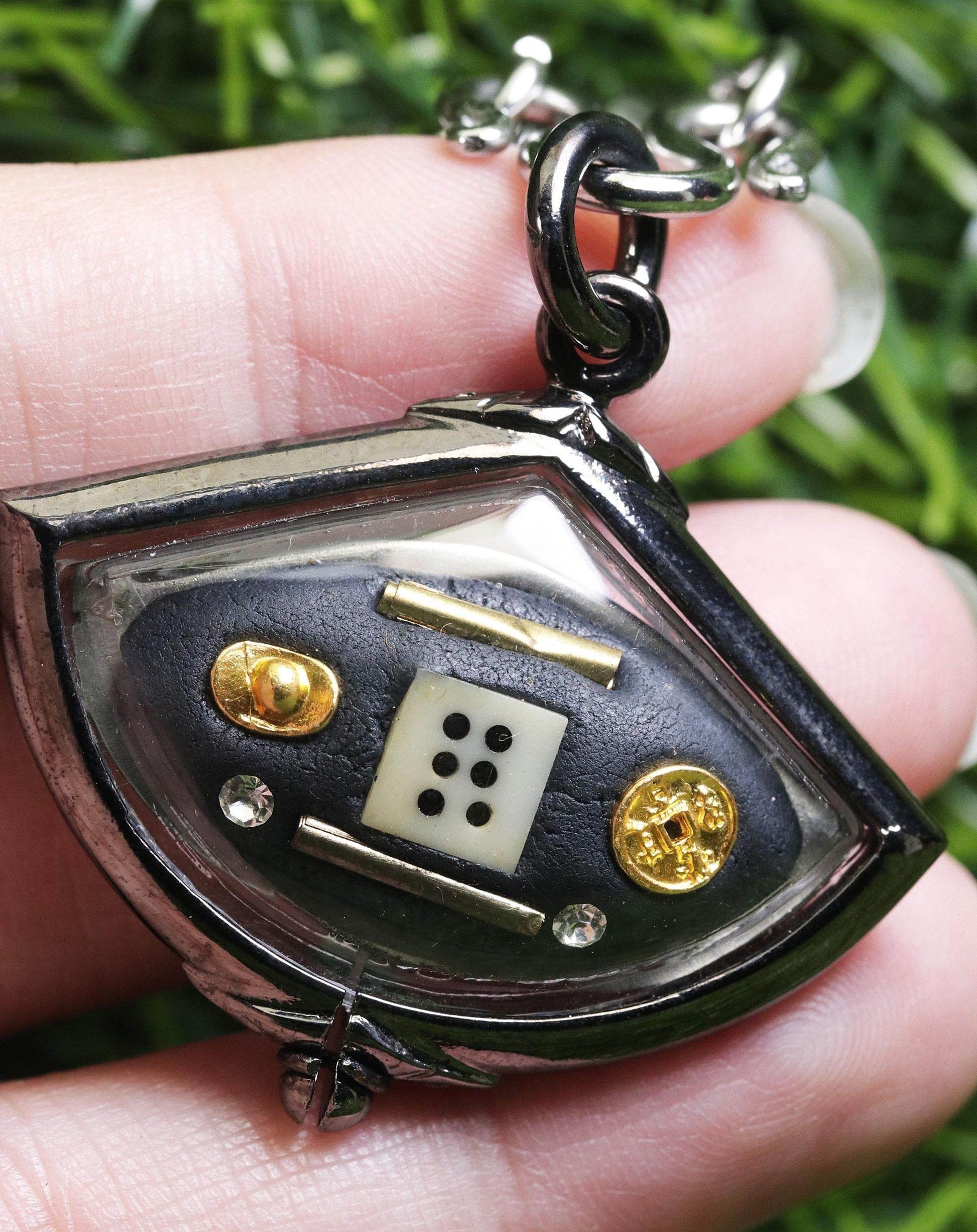 Third eye amulet for protection featuring a detailed design and protective symbols