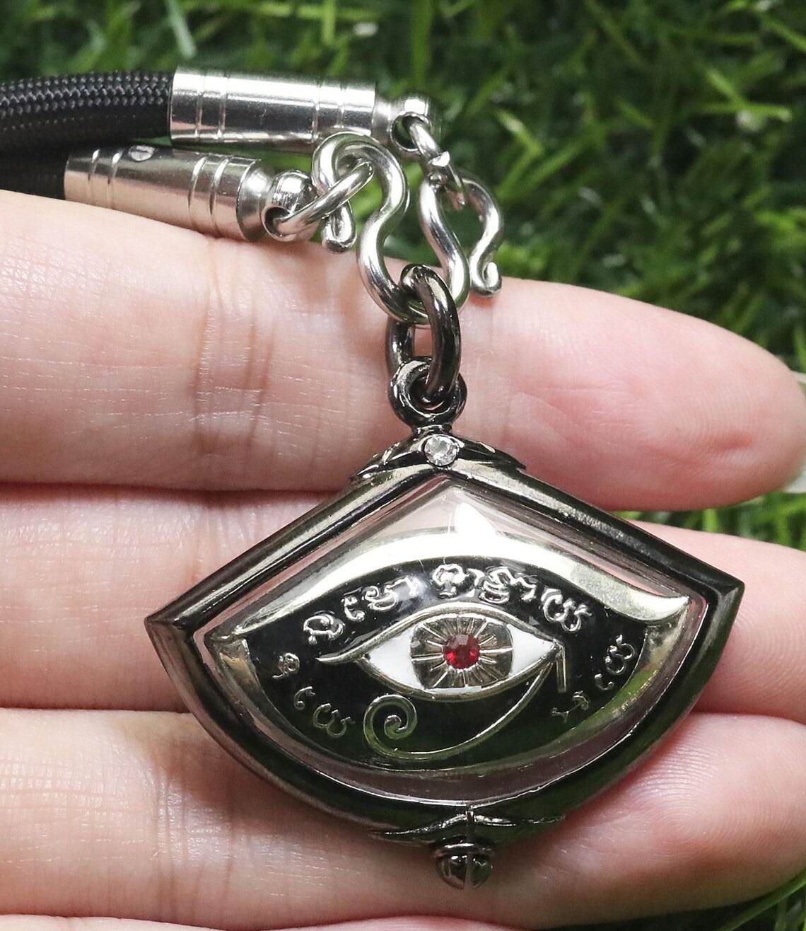 Third eye amulet for protection with intricate design and a red gemstone, ideal for spiritual wellness