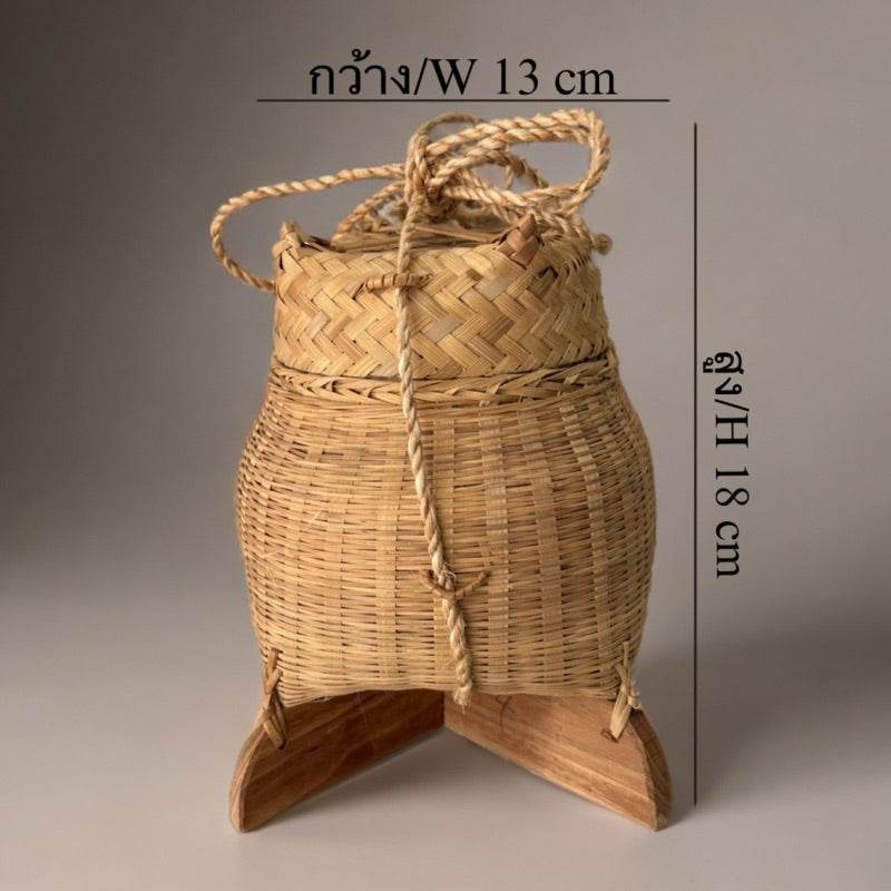 Traditional Thai storage box made of woven bamboo with rope handle and wooden base 13 cm wide 18 cm high