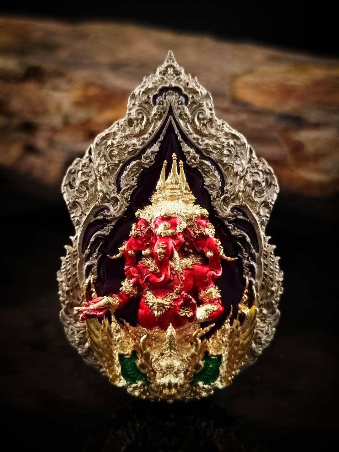 Intricate Trimurti Ganesha medallion for luck featuring vibrant colors and detailed craftsmanship