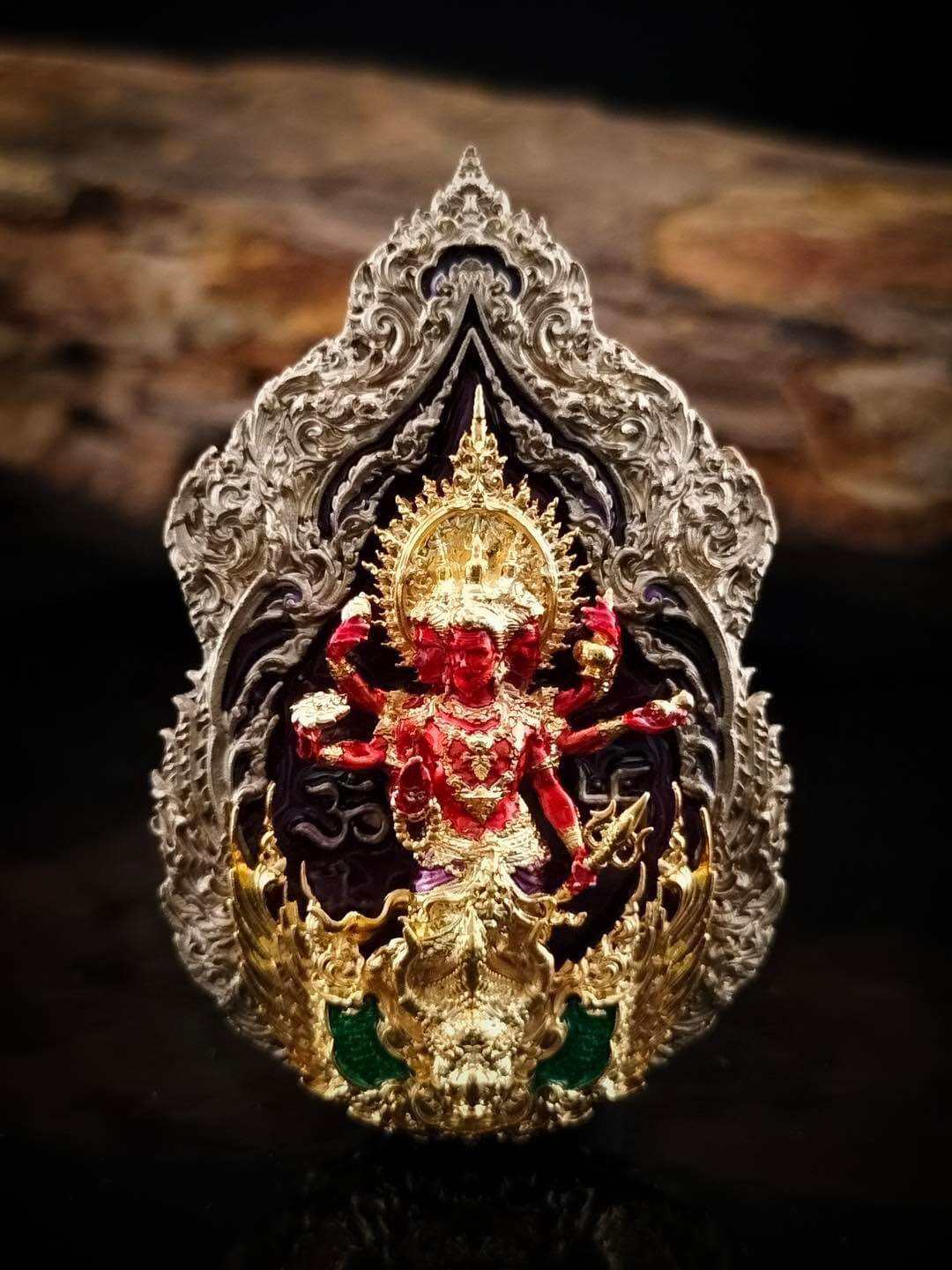 Trimurti Ganesha medallion for luck in intricate silver design with vibrant details